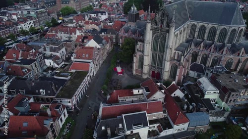 Drone footage of smoke coming out of a red booth next to Hooglandse Kerk in Leiden, the Netherlands photo