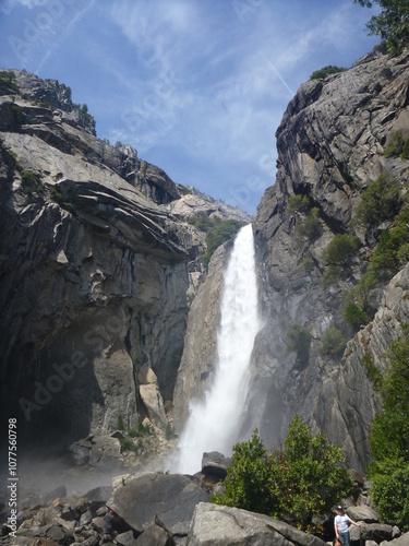 Waterfall cascading down rocks and rocky outcrop in Yosemite, California