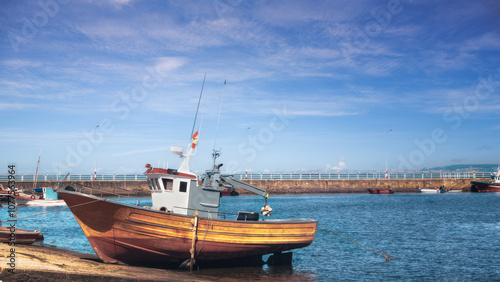 Galician fishing boat with sunset light in Rias Baixas. Galicia Cambados, Spain photo