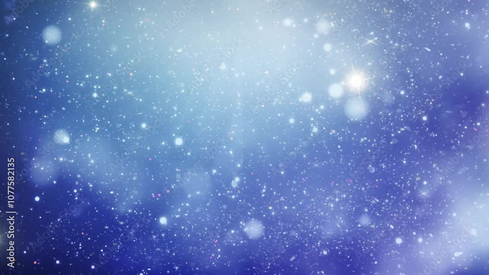 Dreamy Blue Particle Celebration 4K Loop features white glitter or particles falling and swirling against a gradient blue background in a loop.
