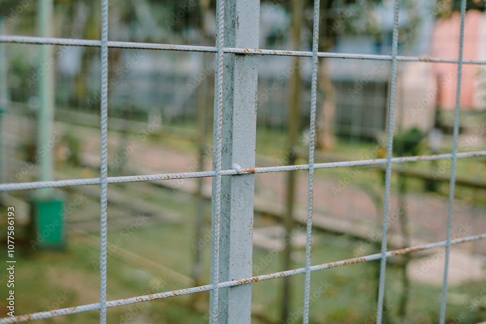 greenhouse structure with rusted metal frames and green walls greenhouse structure with rusted metal frames and green walls