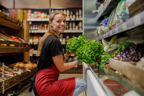 A cheerful and friendly grocer carefully arranges an array of fresh herbs in a lively, inviting market setting