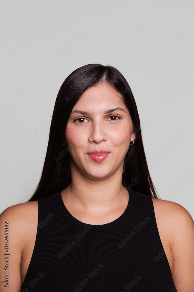 Front portrait of a smiling young woman Front portrait of a smiling young woman