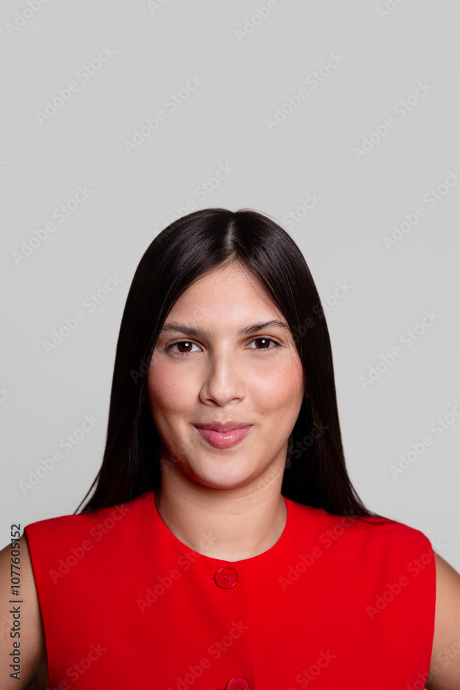 Woman in Red Outfit Smiling with Long Dark Hair