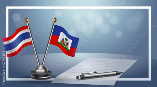 Thailand and Haiti National flags on small table with bokeh background, cooperative relationship