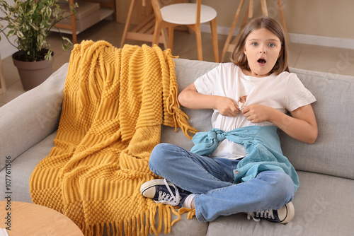 Shocked little girl with st...