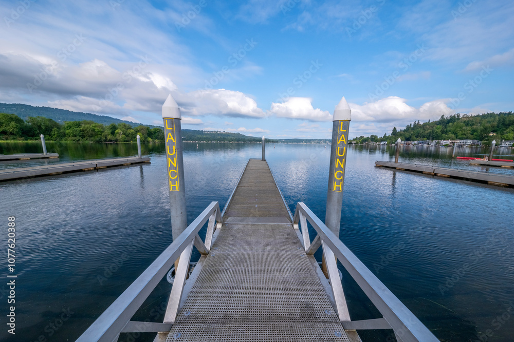 Scenic Lake Boat Launch Dock on Sunny Summer Day Scenic Lake Boat Launch Dock on Sunny Summer Day
