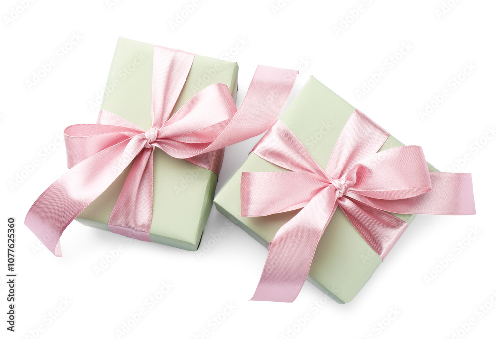 Beautiful gift boxes with pink bows isolated on white, top view Beautiful gift boxes with pink bows isolated on white, top view