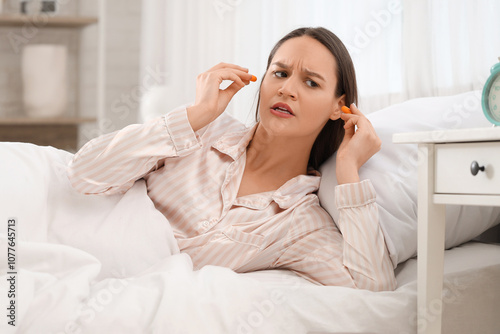 Displeased young woman with...