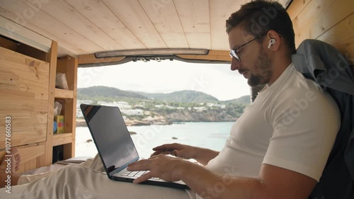 Live the vanlife dream working from a cozy camper van by the sea