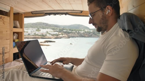 The freedom of vanlife working remotely from the beach