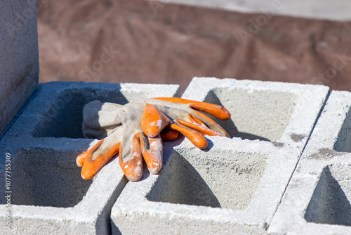 Gloves on cinderblock