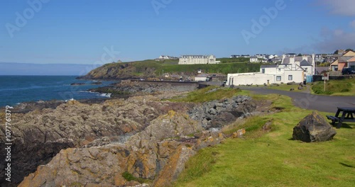 Wide shot looking down Dunskey Street, south cress of the rocky coastline with portPatrick in background photo