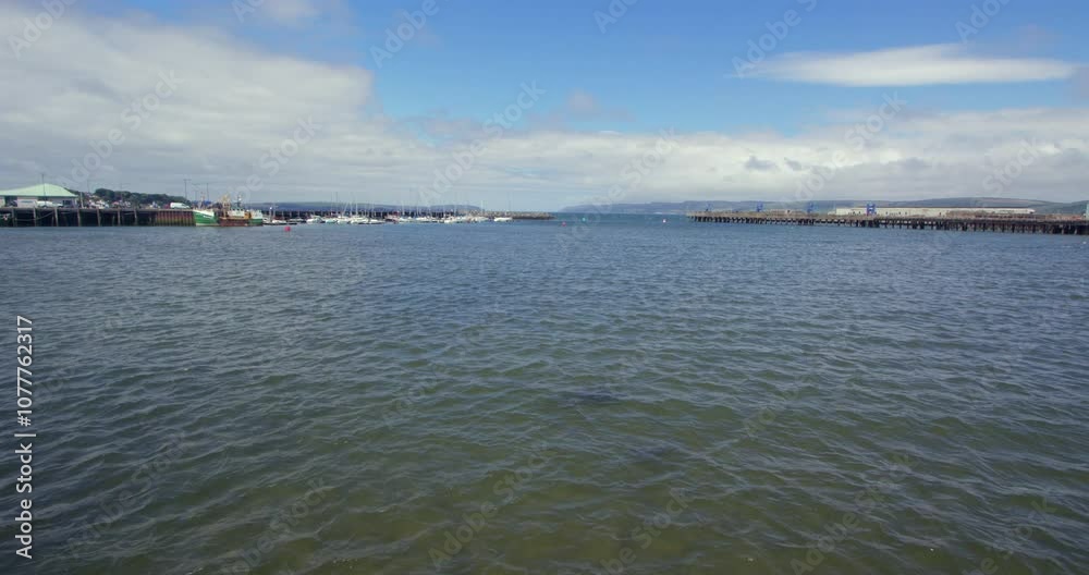Wide shot of Stranraer Harbour and Marina with loch ryan in background Wide shot of Stranraer Harbour and Marina with loch ryan in background