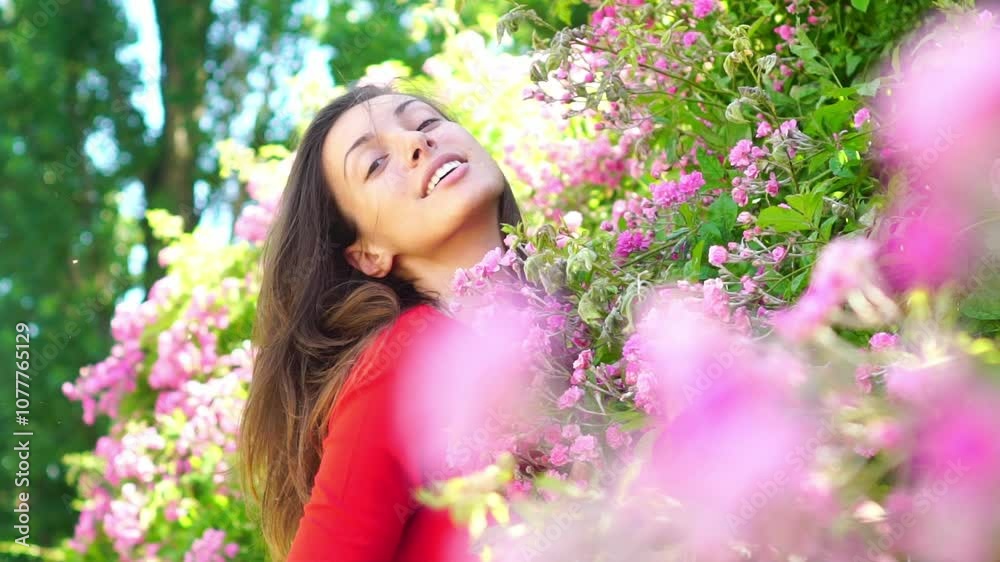 Sexy woman posing in blossom park. Carefree sexy model near blooming spring flower. Pretty sensual girl in spring park near pink blossom flowers. Tenderness romantic model in spring garden outdoor. Sexy woman posing in blossom park. Carefree sexy model near blooming spring flower. Pretty sensual girl in spring park near pink blossom flowers. Tenderness romantic model in spring garden outdoor.