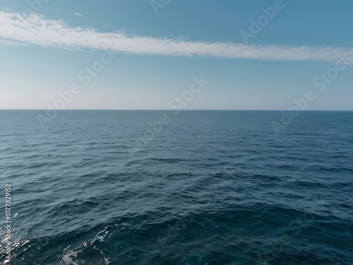 Wallpaper Mural Blue Ocean Surface with White Clouds in the Sky Torontodigital.ca