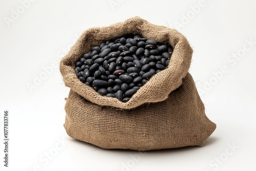 Black beans in brown cloth bag photo