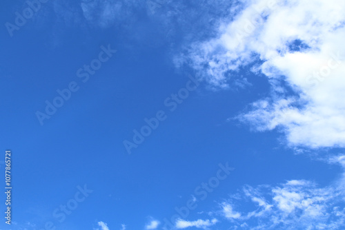 blue-sky abstract with some clouds on summer day .Blue and white copy-space  sky cloudscape. Nature beauty. awesome afternoon view. Copy-space background