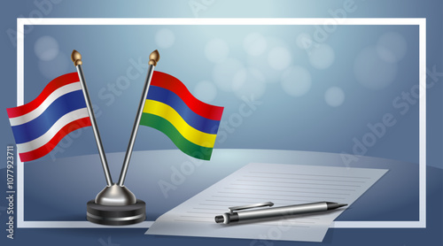 Thailand and Mauritius National flags on small table with bokeh background, cooperative relationship