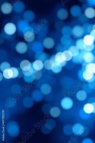 Blue bokeh lights, out of focus circular light patterns, abstract background, soft glow, ethereal atmosphere, deep blue hues, blurred illumination, dreamy nighttime scene, defocused light points, magi