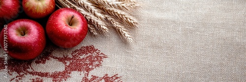 Minimalist flat lay celebrating german harvest festival with apples and wheat photo