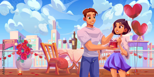 Romantic rooftop cafe setting with young couple enjoying date against city skyline. Decorated terrace with dining table, heart balloons, red roses in vase and lit candles. Man gives gift box to girl.