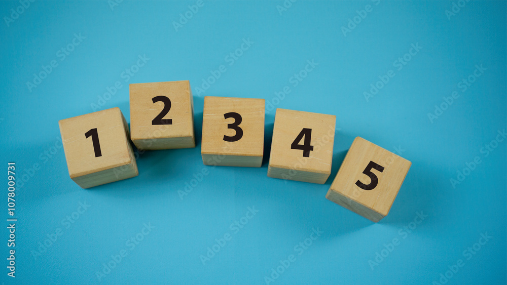 12345 Concept Words on wooden blocks. Idea for healthcare, typography, medical, business and financial concept. Copy space for mockup, marketing and background 12345 Concept Words on wooden blocks. Idea for healthcare, typography, medical, business and financial concept. Copy space for mockup, marketing and background