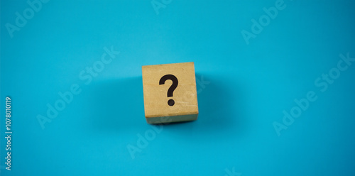 Questioned Marks Symbol Concept on wooden blocks. Idea for healthcare, typography, medical, business and financial concept. Copy space for mockup, marketing and background