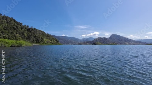 Wallpaper Mural View of the island and the hills. Blue cloudy sky. The footage taken from above the sea. Mandeh, west Sumatra, Indonesia Torontodigital.ca