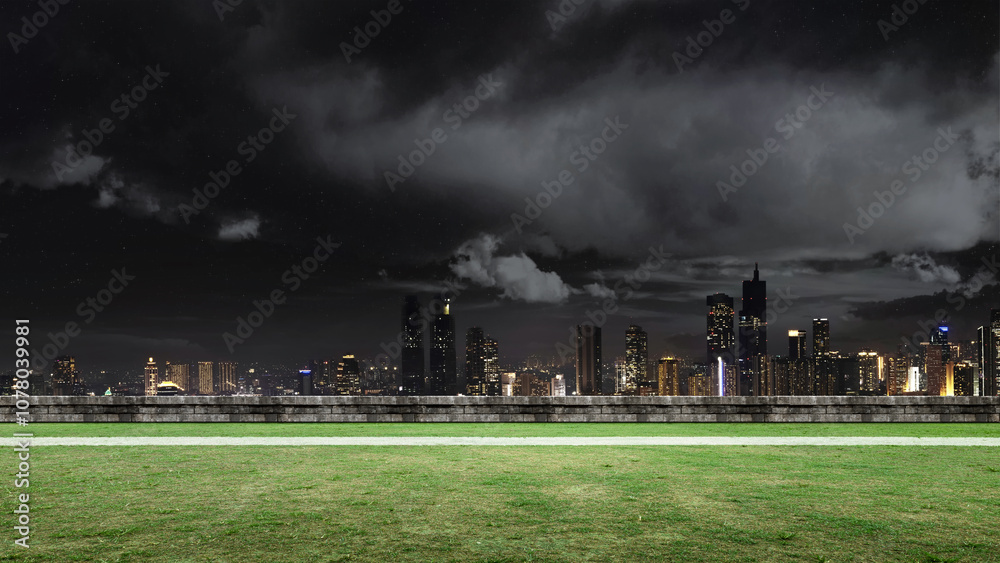 Empty football field with pitch line on green grass with cityscapes. The field is ready for a game Empty football field with pitch line on green grass with cityscapes. The field is ready for a game