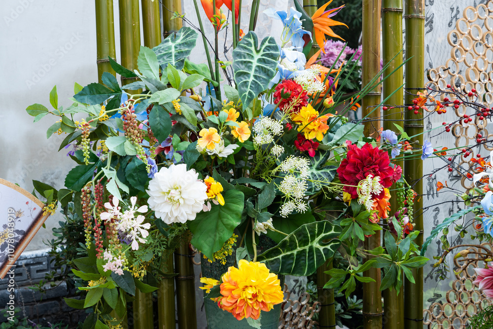 Mixed flower arrangement: various flowers in different colors. A vibrant floral arrangement Mixed flower arrangement: various flowers in different colors. A vibrant floral arrangement