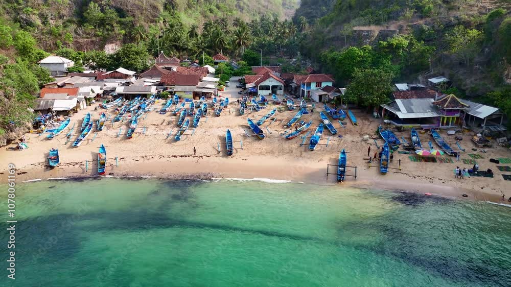 Tropical fishermen village with boats, aerial drone view Tropical fishermen village with boats, aerial drone view
