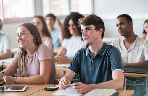 College Students focused listening to professor motivational lecture, learning at High School