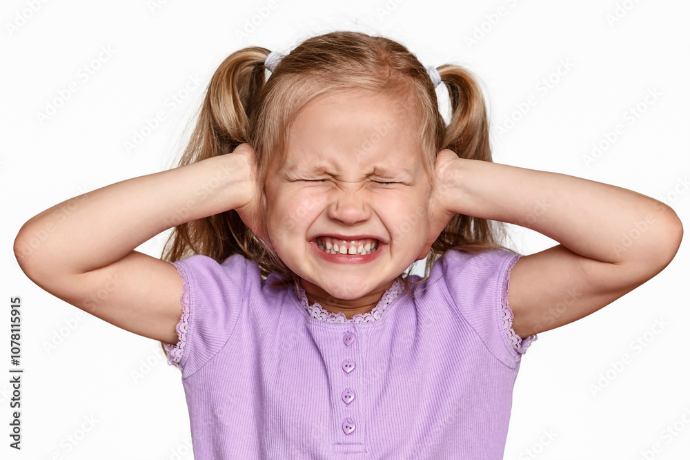 Stressed Child Closing Ears by Hands and Closed Eyes. I don't want hear you! Angry Kid Isolated on White Background Stressed Child Closing Ears by Hands and Closed Eyes. I don't want hear you! Angry Kid Isolated on White Background