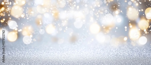 A blurry image of a white background with a few yellow dots