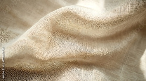 Soft light brown background with gentle fabric texture