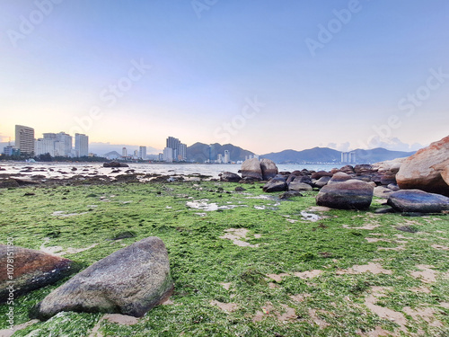 Countless strangely shaped rocks were piled up on the Hon Chong Beach, Nha Trang seaside check-in point, Vietnam photo