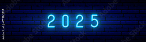 Bright neon 2025 sign on dark brick wall