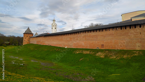 Veliky Novgorod, Russia - May 13, 2024: Kremlin Park. The moat and walls of the Novgorod Kremlin photo