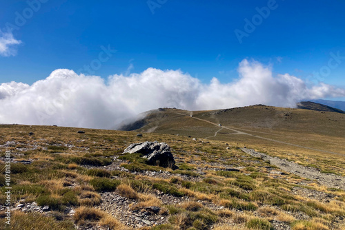 Cloudy over mountains on hiking trail to Mulhacen peak, Sierra Nevada National park, Andalusia, Spain
