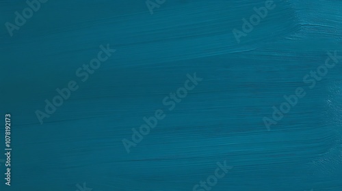 Solid teal blue background with a smooth, flat texture