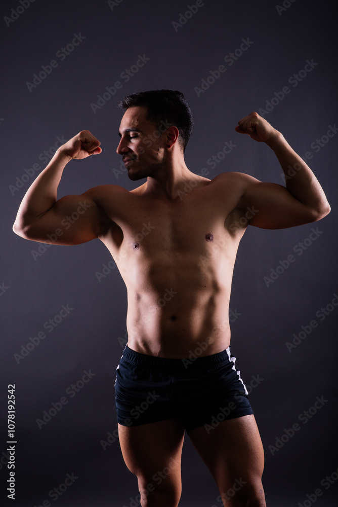 Muscular and torso of young man having abs, bicep and chest. Male hunk with athletic body. Muscular and torso of young man having abs, bicep and chest. Male hunk with athletic body.