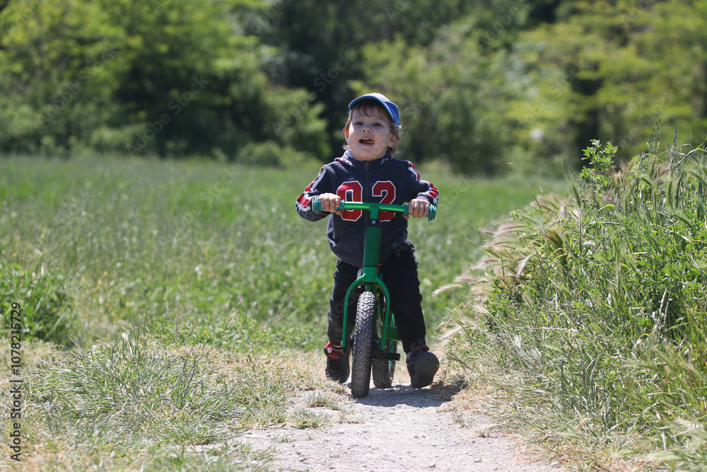 baby on balance bike