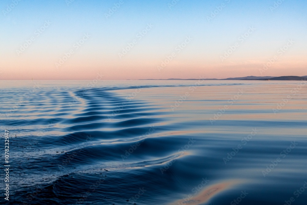 Serene ocean waves at sunset Serene ocean waves at sunset