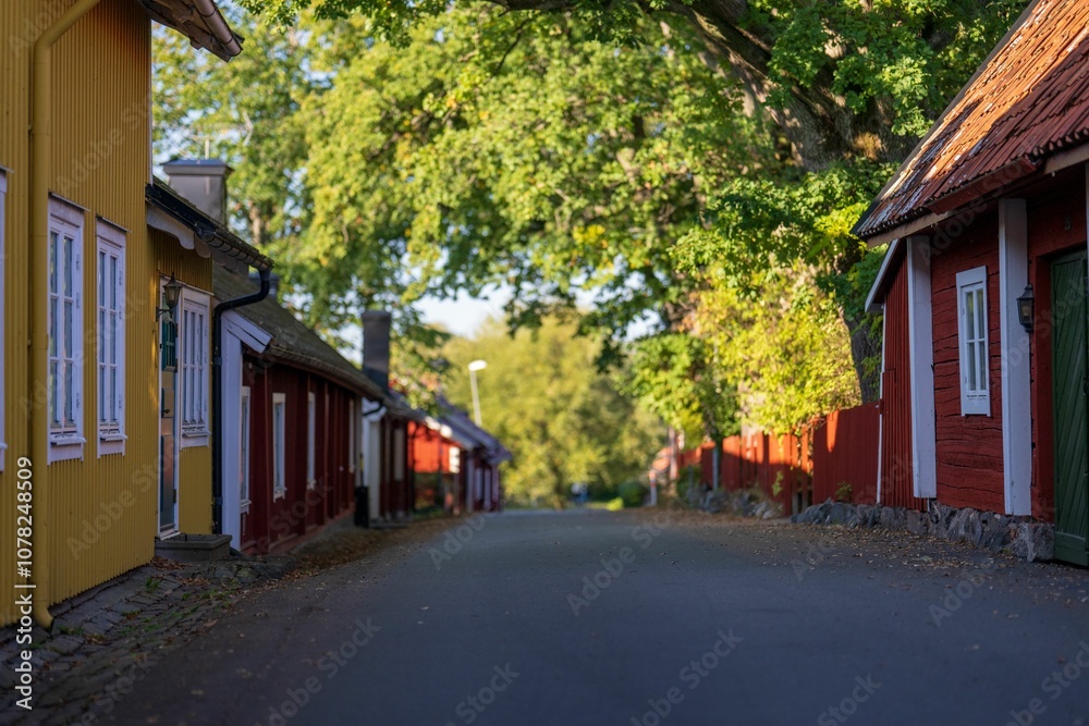 Charming street with colorful wooden houses. Charming street with colorful wooden houses.