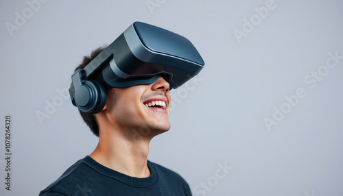 Virtual reality experience, modern technology, immersive entertainment A young man wearing a white VR headset