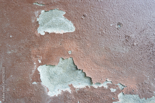 Fototapeta Naklejka Na Ścianę i Meble -  Cement wall surface caused by peeling off of paint applied over the cement.