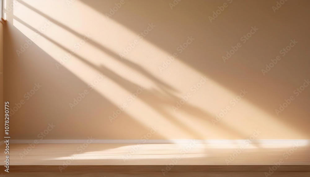 Light beige wall with warm natural sunlight glow.