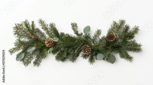 A long, straight Christmas garland of fir branches against a white background, highlighting the natural textures and holiday atmosphere
