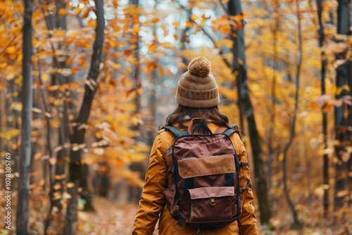 Fall Activity. Woman Walking in Autumn Foliage Forest in Quebec, Canada. Hiking Travel Destination